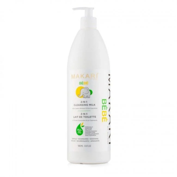 Un grand flacon blanc de Lait Nettoyant 2 en 1 Makari Bébé avec pompe. L'étiquette arbore un motif éléphant et un texte vert mettant en valeur des ingrédients comme l'huile d'argan et le calendula, mettant l'accent sur les soins doux pour la peau des bébés. Dakar