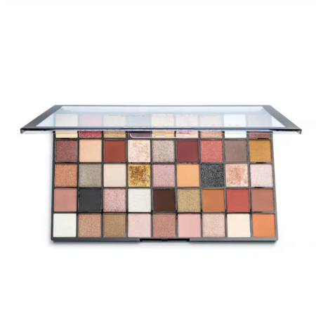 Une palette de maquillage comprenant 45 nuances de fards à paupières. Les couleurs vont des bruns et beiges neutres aux dorés et rouges vibrants, avec un mélange de finis mats et irisés. La palette possède un couvercle transparent. Dakar