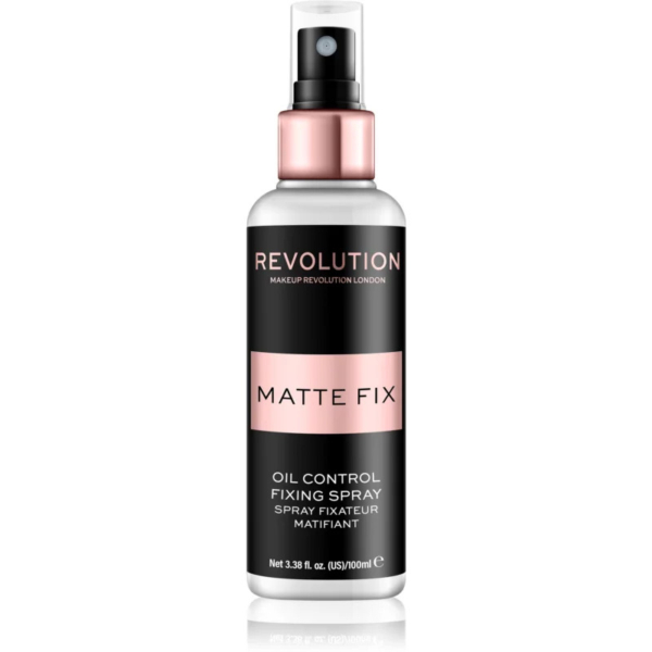 Un flacon de spray fixateur Revolution Matte Fix Oil Control, au design élégant et à l'étiquette noire et rose clair. Le spray est annoncé comme étant de 100 ml. Dakar