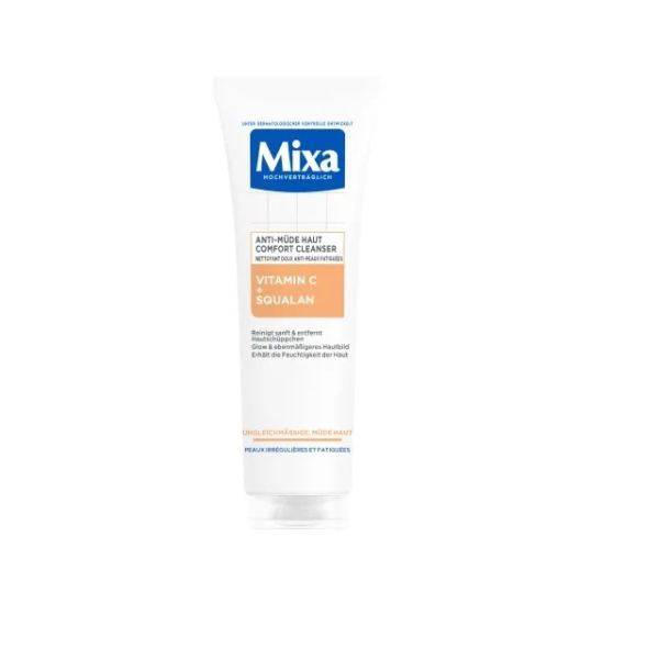 Un tube blanc de nettoyant Mixa Confort à la vitamine C et au squalane est présenté. L'emballage est étiqueté pour les peaux sensibles et présente des détails bleus, orange et blancs. Dakar