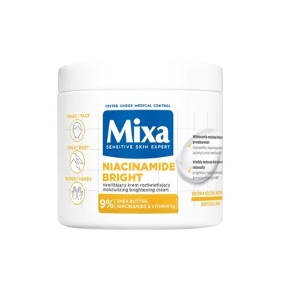 Mixa La Crème Niacinamide Correction Éclat Visage Corps Mains 400 ml est une crème blanche en pot contenant 9% de beurre de karité, du niacinamide et de la vitamine Cg, conçue pour hydrater et éclaircir la peau sèche et terne du visage, du corps et des mains. Dakar