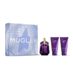 Coffret cadeau Mugler composé d'un flacon de parfum et de deux tubes étiquetés « Alien » sur un coffret violet et bleu orné du texte « MUGLER » et d'un motif étoilé. Ce coffret allie élégance et design futuriste. Dakar