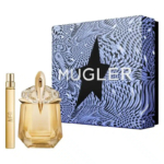 Un coffret cadeau Mugler comprenant un flacon de parfum ambré au bouchon cristallin et un vaporisateur de voyage assorti. Ce coffret est livré dans un écrin bleu et noir orné d'une étoile et de l'inscription « Mugler » en gras. Dakar
