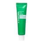 Un tube vert étiqueté « NINELESS Crème Anti Imperfections et Rougeurs à l'Acide Azélaïque A-Control » cible les peaux à tendance acnéique avec 10 000 ppm d'acide azélaïque et 3 000 ppm de panthénol. Contient 50 ml (1,69 fl. oz.), similaire au Sérum Éclat à l'Acide Azélaïque de NINELESS. Dakar