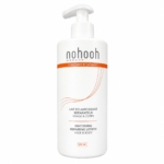 Le flacon pompe blanc de 500 ml de Nohooh Lait Eclaircissant Reparateur Visage et Corps présente des accents orange et un étiquetage français/anglais pour une utilisation sur le visage et le corps. Dakar