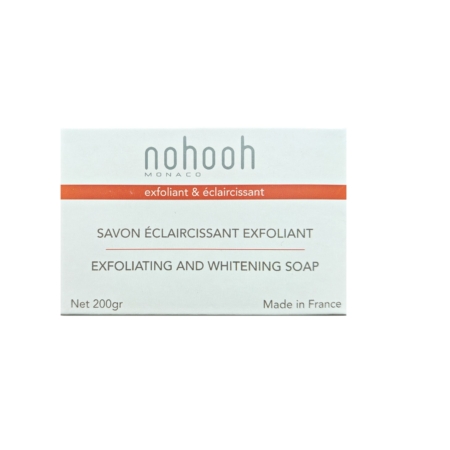 L'emballage du Savon Eclaircissant Exfoliant Coco 200 g de Nohooh affiche un texte français et anglais sur une boîte principalement blanche avec des accents orange, soulignant son origine fabriquée en France et faisant allusion à une essence de citronnelle rafraîchissante. Dakar