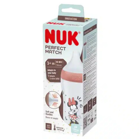 Boîte d'un biberon NUK Perfect Match, conçu pour les nourrissons de 3 mois et plus. L'emballage, orné d'un personnage de dessin animé, met en valeur sa douceur, sa flexibilité et sa conception anti-colique. Dakar
