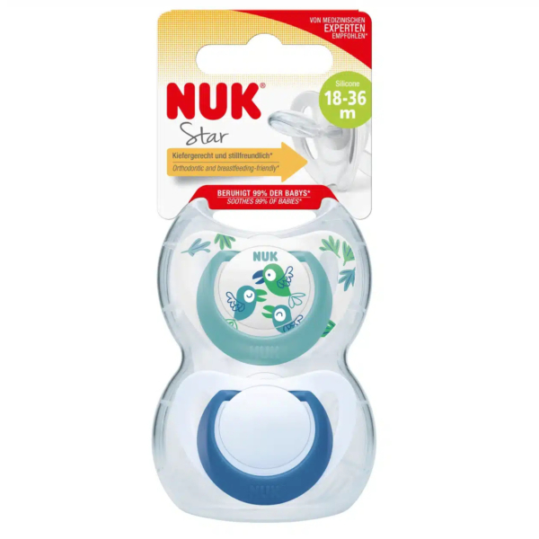 Emballage d'une sucette NUK Star pour les 18-36 mois, ornée d'un motif de grenouille. Ce produit est en silicone, orthodontique et adapté à l'allaitement. L'emballage indique la marque, les caractéristiques et l'âge du produit. Dakar