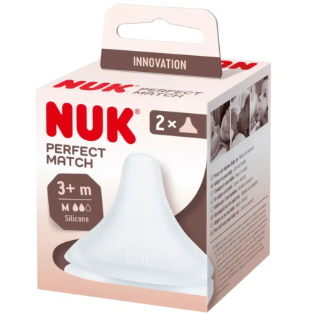 Emballage des tétines de biberon en silicone NUK Perfect Match. La boîte contient deux tétines à débit moyen pour les bébés de 3 mois et plus. Le devant présente le nom du produit et une image de tétine. Le dessus porte l'inscription « Innovation ». Dakar