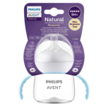 Une tasse d'apprentissage Philips Avent pour les enfants de 6 mois et plus. Elle est dotée d'un couvercle blanc et de deux anses bleues, et l'inscription « Natural Response » indique une transition facile du biberon à la tasse. Sa capacité est de 150 ml. Son emballage est violet et blanc. Dakar