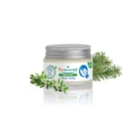 Un pot de baume Puressentiel Resp OK Bébé, muni d'un couvercle à vis métallique, est présenté aux côtés de brins de thym et de pin, suggérant des ingrédients naturels. L'étiquette est blanche avec un texte vert et bleu. Dakar