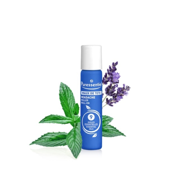 Un flacon roll-on bleu, étiqueté « Puressentiel Maux de Tête Maux de Tête », est entouré de brins de lavande et de feuilles de menthe. Doté d'un bouchon blanc, il est conçu pour l'application d'huiles essentielles. Dakar