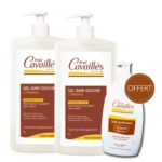 Deux flacons de gel douche Rogé Cavaillès L'Original avec pompe sont présentés. Un flacon plus petit de lait corporel Rogé Cavaillès, étiqueté « soin hydratant », se trouve à droite, avec le texte promotionnel « OFFRE ». Tous les produits sont destinés aux peaux sensibles. Dakar