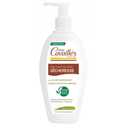 Flacon blanc de gel douche intime Rogé Cavaillès avec pompe. Son étiquette indique qu'il est conçu pour les peaux sèches, contient de l'huile d'olive nourrissante et est 97 % naturel. Texte vert et marron avec descriptions en français et « Usage Quotidien » sur une bande verte. Dakar
