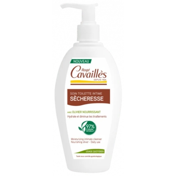 Flacon blanc de gel douche intime Rogé Cavaillès avec pompe. Son étiquette indique qu'il est conçu pour les peaux sèches, contient de l'huile d'olive nourrissante et est 97 % naturel. Texte vert et marron avec descriptions en français et « Usage Quotidien » sur une bande verte. Dakar