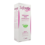 Boîte blanche et rose de Saforelle Soin Lavant Doux pour l'hygiène intime et corporelle. L'emballage est imprimé en français et en anglais, soulignant son utilisation quotidienne et son action irritante. Contient de la bardane. Fabriqué en France, 500 ml. Dakar