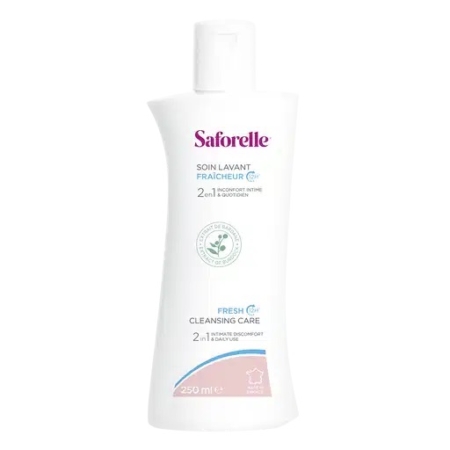 Flacon blanc de Saforelle Nettoyant Fraîcheur, de forme incurvée, orné d'une étiquette rose et verte. D'une contenance de 250 ml, il est conçu pour l'hygiène intime. L'étiquette comporte des textes en français et en anglais. Dakar