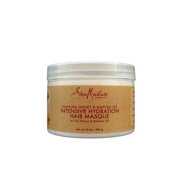 Un pot de masque capillaire SheaMoisture Hydratation Intense au miel de Manuka et à l'huile de Mafura. Le contenant est de couleur crème avec une étiquette marron indiquant qu'il contient de l'extrait de figue et de l'huile de baobab. Le pot contient 284 g. Dakar