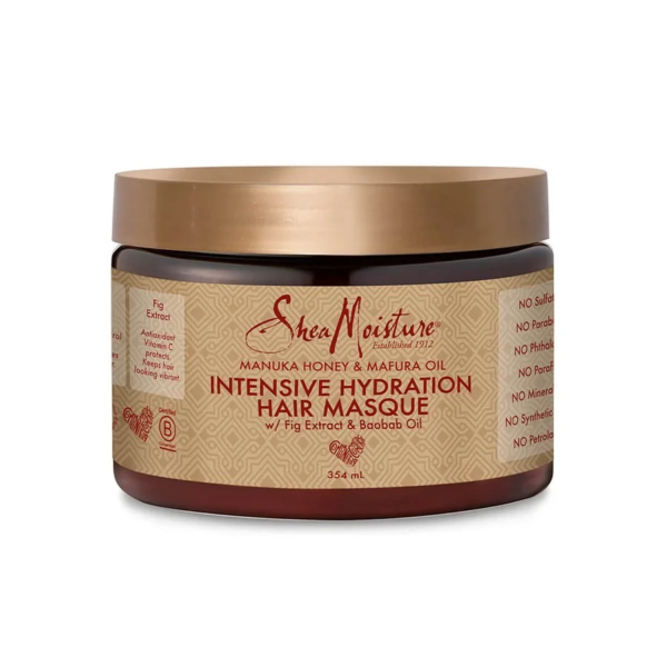 Pot marron de masque capillaire SheaMoisture Hydratation Intense au miel de Manuka et à l'huile de mafura. L'étiquette met en avant des ingrédients comme l'extrait de figue et l'huile de baobab. Le couvercle du pot est doré et il contient 354 ml de produit. Dakar