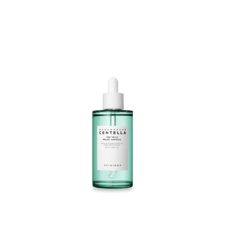 Un flacon vert de sérum de soin avec une étiquette blanche portant les inscriptions « Centella » et « Skin1004 ». Son bouchon compte-gouttes est blanc. Son design est simple sur fond blanc uni. Dakar