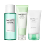 Trois produits de soin de la gamme Tea-Trica de Skin1004, comprenant une lotion tonique purifiante aux tons verts et deux tubes de crème. Tous sont étiquetés comme étant fabriqués à partir de centella pure de Madagascar. Dakar