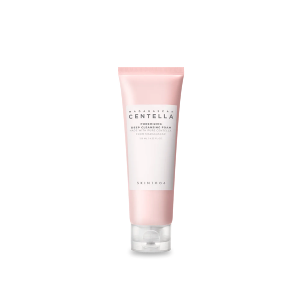 Tube rose et blanc de mousse nettoyante profonde Skin1004 à la centella de Madagascar, avec bouchon à clapet transparent, sur fond blanc. L'étiquette présente un texte minimaliste indiquant le nom et les informations du produit. Dakar