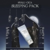 Image publicitaire d'un tube étiqueté « Hyalu-Cica Sleeping Pack » de Skin1004, sur fond de ciel nocturne éclairé par une lanterne. Texte : « Voyagez en toute tranquillité avec les mini-ampoules Coffret Skin1004. Reposez-vous en toute sérénité. Dakar