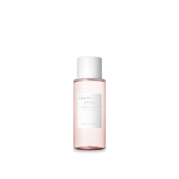 Une bouteille rose avec un bouchon blanc, étiquetée « Centella » en gros caractères et « Skin1004 » en dessous. Le liquide à l'intérieur est rose clair. La bouteille se détache sur un fond blanc uni. Dakar