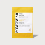 Emballage jaune et blanc du masque sérum anti-imperfections Yuja Niacin 30 jours de SOME BY MI. Le devant présente des informations sur l'extrait de yuja, la niacinamide et les vitamines. L'illustration du masque est également incluse. Dakar