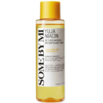 Un flacon cylindrique de Lotion Tonique Éclat Miracle 30 Jours Yuja Niacin de Some By Mi. L'étiquette met en avant les ingrédients clés : extrait de yuja et niacinamide. Le flacon transparent avec un bouchon jaune contient 150 ml de produit. Dakar