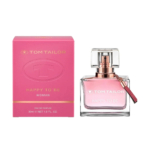 Coffret rose et flacon en verre du parfum pour femme « Tom Tailor Happy To Be ». Le coffret arbore un logo et un texte dorés, tandis que le flacon est doté d'un bouchon argenté et d'une pampille rose. Le flacon contient 30 ml d'eau de parfum. Dakar