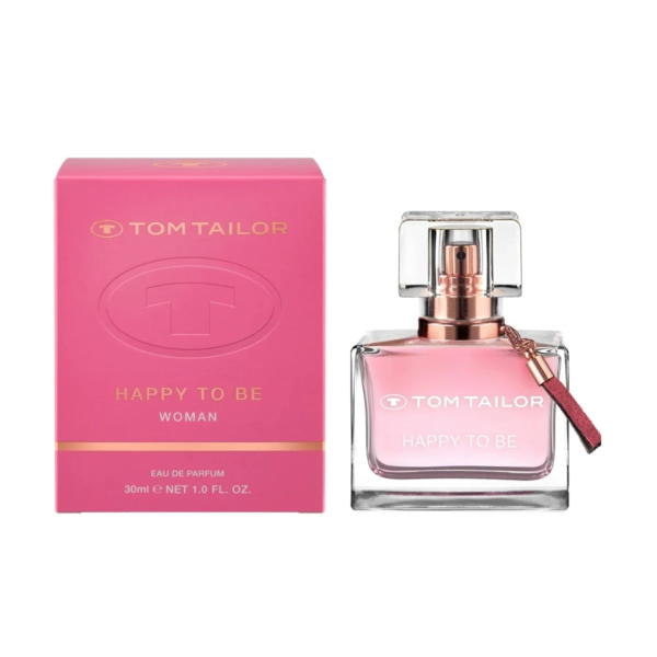 Coffret rose et flacon en verre du parfum pour femme « Tom Tailor Happy To Be ». Le coffret arbore un logo et un texte dorés, tandis que le flacon est doté d'un bouchon argenté et d'une pampille rose. Le flacon contient 30 ml d'eau de parfum. Dakar