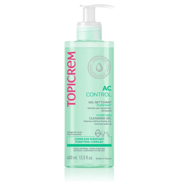 Flacon de gel nettoyant purifiant Topicrem AC Control avec pompe. Son étiquette verte précise son utilisation et son volume de 400 ml (13,5 oz liq.). Convient au visage et au corps, il est indiqué pour éliminer les impuretés. Dakar