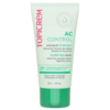 Un tube de Masque Purifiant Topicrem AC Control aux argiles blanche et verte pour peaux mixtes à grasses. Ce tube de 50 ml est accompagné d'un texte en anglais et en français soulignant ses propriétés sébo-absorbantes et resserrantes. Dakar