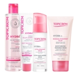 Image de quatre produits de soin Topicrem : un gel nettoyant doux, une crème éclat légère, un sérum ultra-hydratant et un masque éclat hydratant. Tous sont présentés dans un emballage blanc et rose, avec des informations détaillées en anglais et en français. Dakar