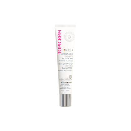 Un tube de crème de jour anti-taches Topicrem MELA, conçu pour corriger et prévenir les taches brunes. Ce tube, à fond blanc avec inscription rose et noire, contient 40 ml de produit. Dakar