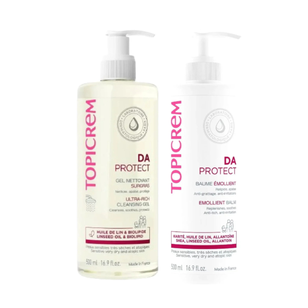 Deux soins Topicrem DA Protect : un flacon pompe transparent de gel nettoyant ultra-riche à l'huile de lin et aux biolipides, et un flacon pompe blanc de baume émollient au karité, à l'huile de lin et à l'allantoïne. Tous deux sont de 500 ml. Dakar