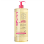 Un grand flacon transparent d'Huile de Douche Ultra Hydratante Topicrem avec une pompe rouge. L'étiquette comporte un texte rose et un sceau. Ce produit de 1000 ml contient de l'huile d'olive et de la glycérine, idéal pour les peaux sèches et sensibles. Dakar