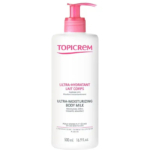 Un flacon blanc de Lait Corps Ultra-Hydratant Topicrem avec une pompe rose. L'étiquette souligne son hydratation 24 heures et son adéquation aux peaux sensibles et sèches. Le flacon est de 500 ml. Dakar