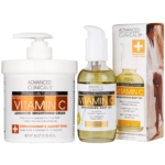 Le Coffret Crème Corporelle à la Vitamine C + Huile Corporelle ADVANCED CLINICALS comprend un grand pot blanc de crème, un flacon pompe d'huile corporelle et une boîte assortie, tous dotés d'étiquettes orange et blanches. Dakar