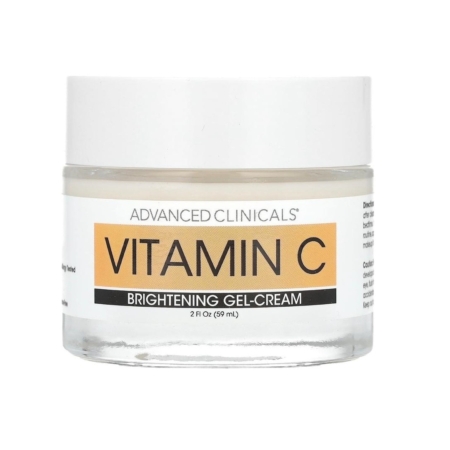 Un pot transparent d'Advanced Clinicals Gel Crème Éclaircissant Visage à la Vitamine C, 74 ml, avec un couvercle blanc et une étiquette comportant un texte orange et noir. Dakar