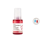 Un petit flacon de 30 ml d'Aroma Zone Sérum Concentré Anti Taches et Imperfections avec 10 % d'acide glycolique et d'AHA. L'étiquette rouge et blanche présente un texte en français, un logo circulaire du fabricant français à droite et un bouchon transparent. Dakar