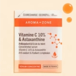 L'emballage du Sachet Eco-recharge Concentré Vitamine C 10% et Astaxanthine 30ml d'Aroma Zone présente un schéma moléculaire, l'étiquette « Écorecharge | Ecorefill » et met en avant sa nature 100% recyclable, ses bienfaits antioxydants et son origine française, avec deux gouttes en haut à droite. Dakar