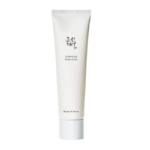 Un tube blanc de 100 ml de Beauty of Joseon Crème Hydratante Dynasty Cream présente un texte noir coréen et anglais sur le devant, debout sur un fond blanc uni. Dakar