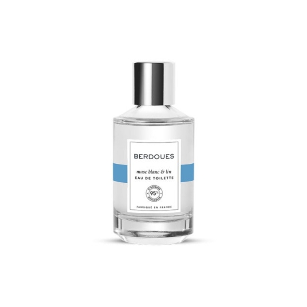 L'Eau de Toilette BERDOUES Musc Blanc & Lin présente un flacon en verre transparent avec un bouchon argenté, une étiquette minimaliste aux accents bleus et des notes alléchantes de Monoï et de Coco, affichant fièrement « Fabriqué en France » pour mettre en valeur son parfum et son origine. Dakar