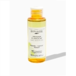 Un flacon en plastique transparent de BYPHASE HUILE DE SOIN SUBLIMATRICE AVOCAT 100 ml avec un bouchon jaune, aux bienfaits hydratants et composé à 98 % d'ingrédients d'origine naturelle. Le flacon projette une ombre douce. Dakar