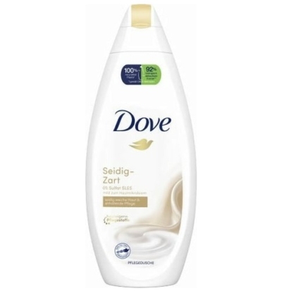 Une bouteille blanche de 250 ml de Dove Gel Douche Douceur Soyeuse avec un bouchon doré, un logo Dove bleu et un graphisme tourbillonnant présente 0 % de sulfates, une crème hydratante, ainsi que des autocollants d'information verts et violets sur l'étiquette. Dakar