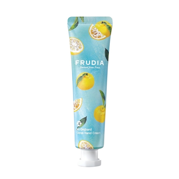 Un tube bleu de Frudia Crème Mains My Orchard au Citron 30 g avec des illustrations d'agrumes jaunes et de feuilles vertes, terminé par un bouchon blanc en bas. Dakar