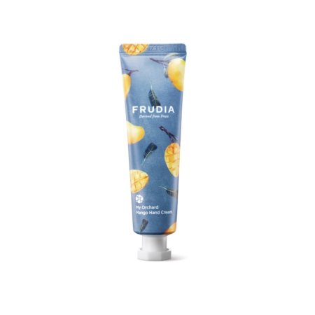 Un tube de Frudia Crème Mains Mon Verger à la Mangue 30 g se dresse sur un fond bleu, décoré de mangues et de feuilles. Le bouchon est blanc. Dakar