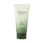 Un tube de 150 ml de Heimish Matcha Biome Amino Mousse Nettoyante Anti Imperfections, doté d'un design dégradé vert et d'un bouchon gris, adapté aux peaux à tendance acnéique et sensibles. Dakar